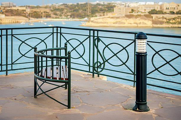 White chairs and table overlooking the green valley
