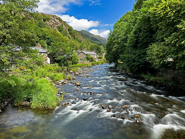 View along the River Glaslyn in Beddgelert, North Wales, UK