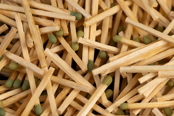 istock matches scattered in a large pile, scattered wooden matches without matchboxes on the table, closeup 2223808184