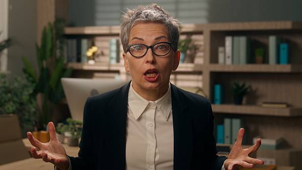 istock Business problem angry talking negative speaking mad furious arguing talk to camera video call Caucasian senior woman middle-aged businesswoman mature female worker entrepreneur in office work failure 2223809312
