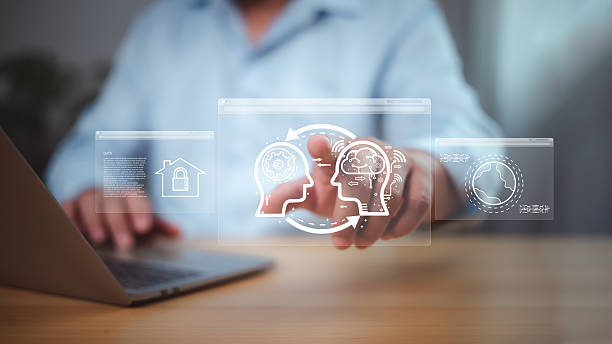 istock Futuristic digital learning and global communication concept with holographic human heads and smart technology icons 2223811412
