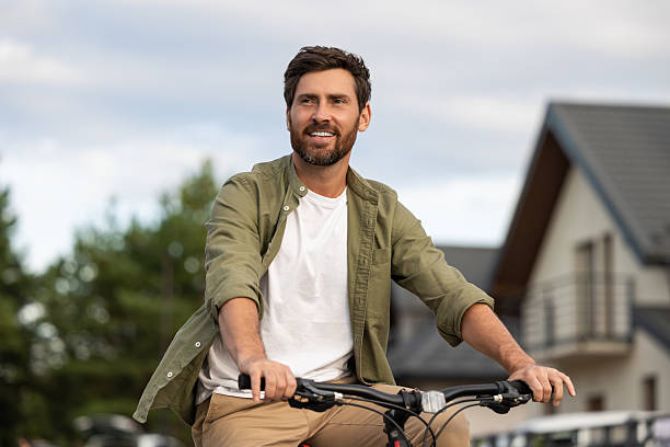 istock Bearded caucasian young man on a bike looking confident 2223813205