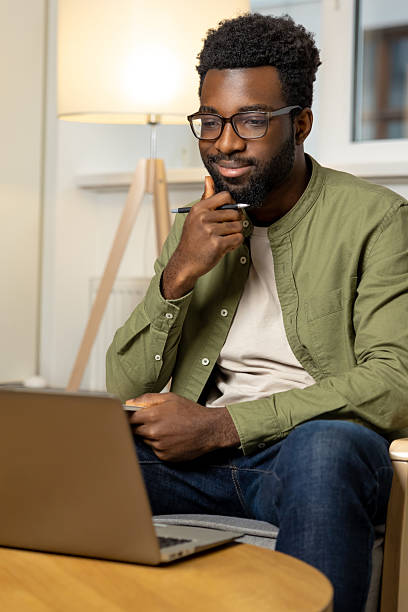 istock African american young man working on a laptop 2223822773
