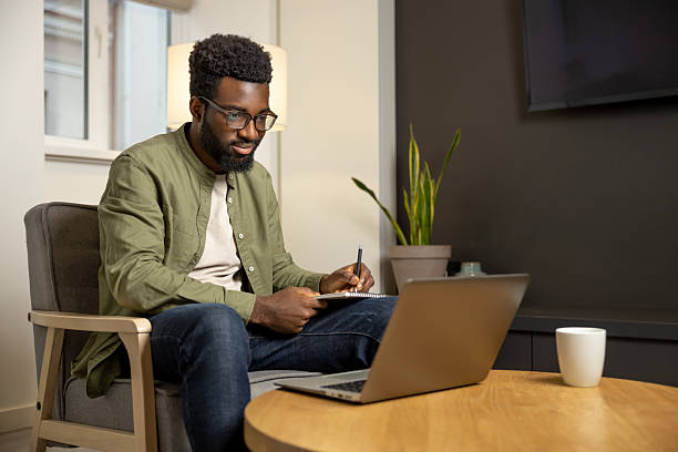 istock African american young man working on a laptop 2223822789