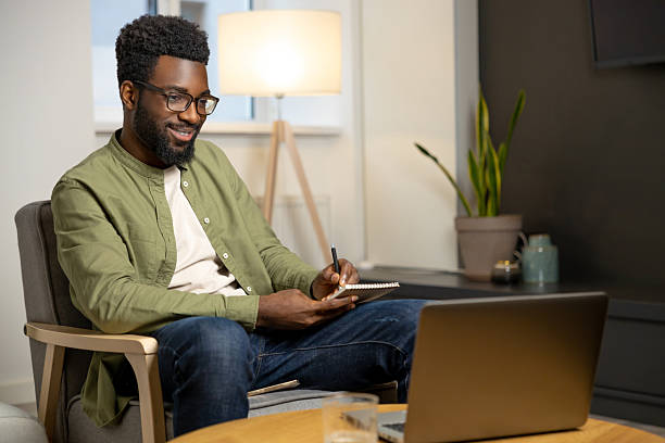 istock Young businessman working from home and looking busy and involved 2223822830