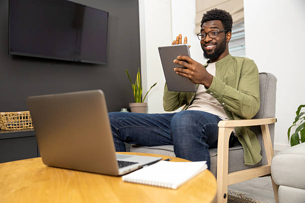 istock Young man having a video call and looking excited and involved 2223822853