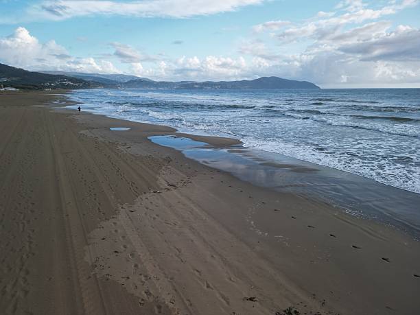 istock rough sea that washes the beach 2223825019