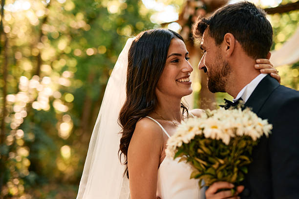istock Happy Couple Exchanging Loving Glances on Their Wedding Day 2223832479
