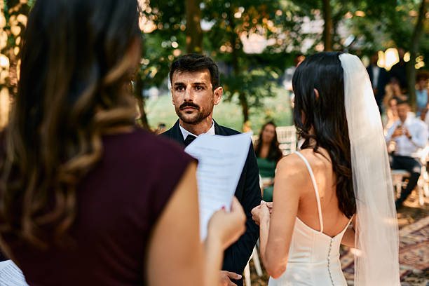 istock Groom looking at the officiant during wedding ceremony 2223832531