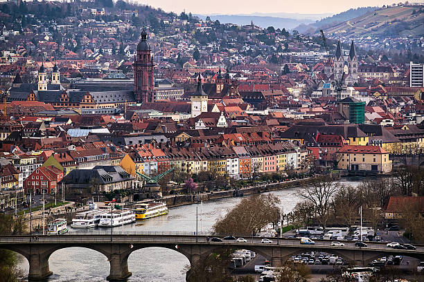 Wuerzburg, Germany - March 29, 2025: Würzburg am Main at the beginning of spring. in the foreground the Peace Bridge.