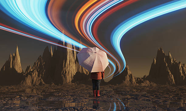 istock Girl with umbrella at magical landscape 2223835455
