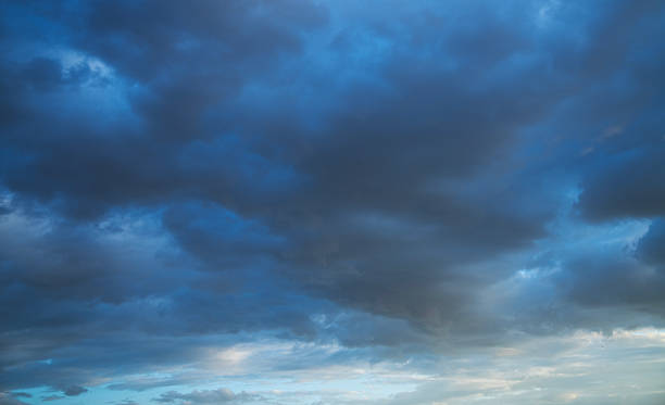 istock Beautiful bright sunset sky background with clouds.  Evening time 2223841324