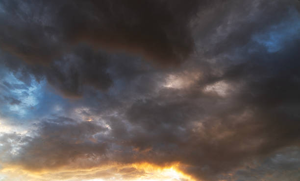 istock Beautiful bright sunset sky background with clouds.  Evening time 2223841825