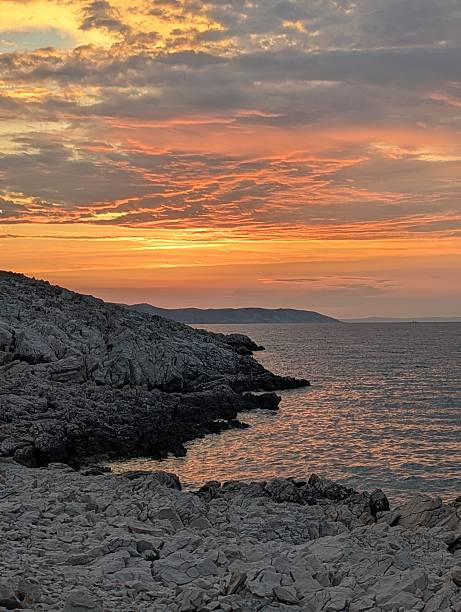 istock Sunset over the sea 2223842110