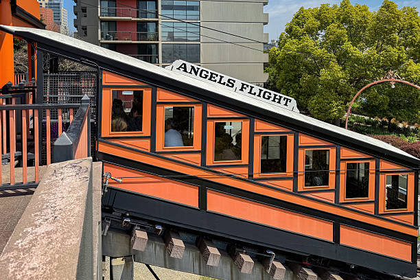 Los Angeles, California, USA - April 18, 2024: Historic orange Angels Flight funicular climbing Bunker Hill in downtown L.A.