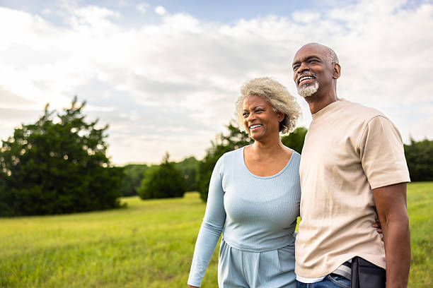 istock Senior black couple walking outdoors at sunset in the pasture 2223854809