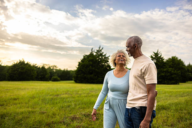 istock Senior black couple walking outdoors at sunset in the pasture 2223854823