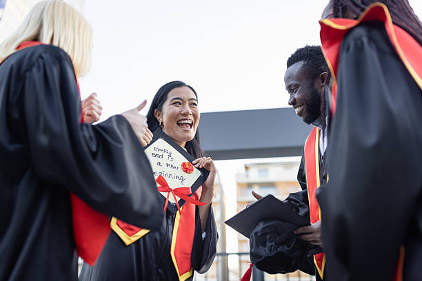 istock Graduation Celebration in Cap and Gown 2223855953