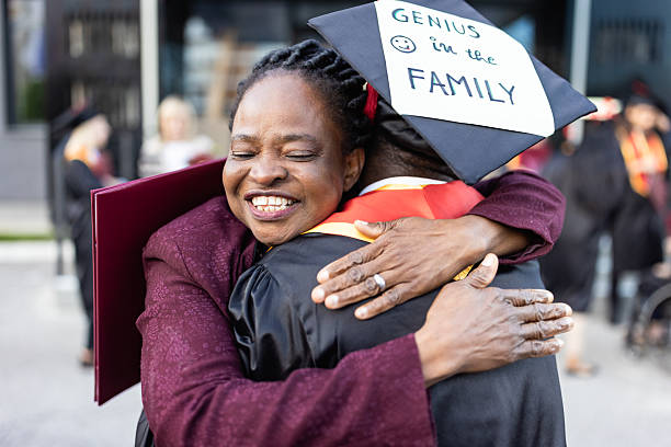 istock Graduation Day Hug: Celebrating Achievement with Family 2223855994