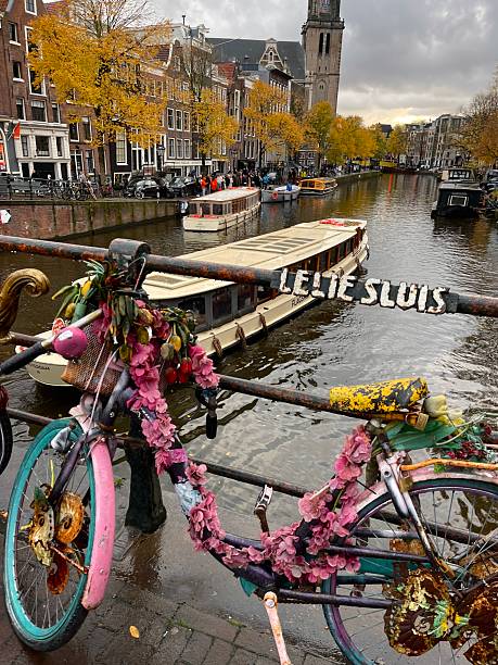 istock Parked bike above a busy river 2223858261