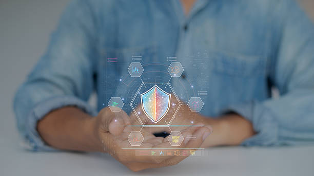 istock Businessman showing virtual shield icon in hand, representing cybersecurity protection, data privacy, and digital security technology. 2223863005