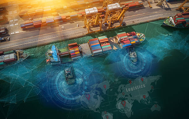 istock Aerial view and top view cargo plane flying above ship port coverage world map import-export business and logistics international goods. Shipping cargo to harbor by crane 2223865282