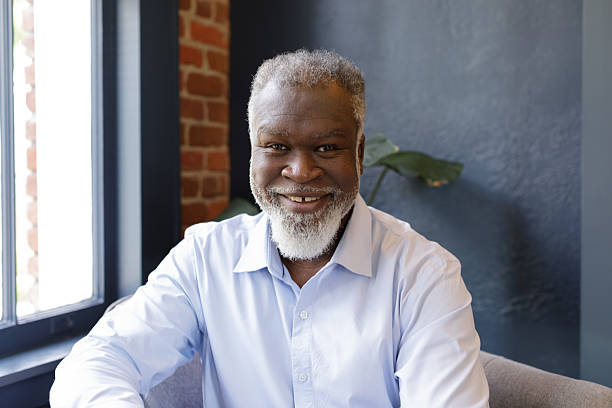 istock friendly middle-aged African american man smiles looking at camera 2223871823
