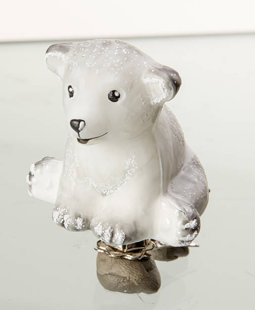 istock Polar bear decorates Christmas tree isolated nature background with clipping path 2223872285
