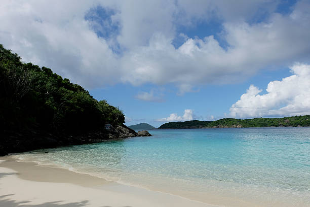 istock Crystal Clear Caribbean Shoreline with Distant Island Views 2223875759