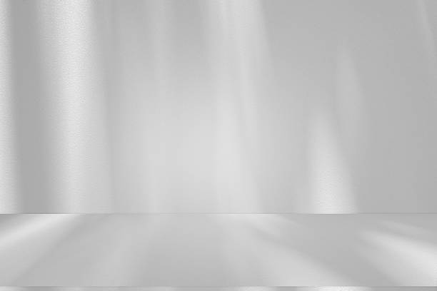istock Wall interior background, studio and backdrops show products.with shadow from window color white . background for text insertion and presentation product 2223875842