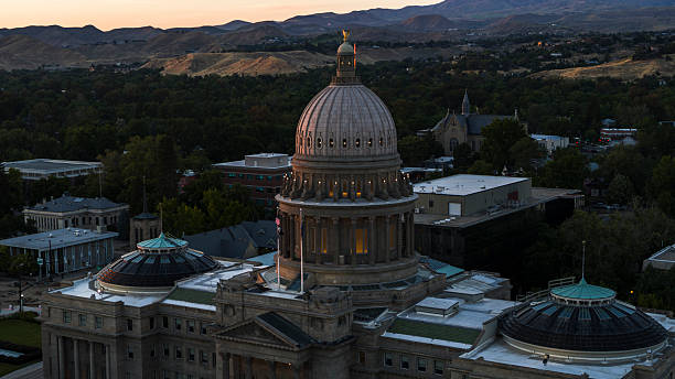 istock Idaho State Capitol building with mountain range backdrop in Boise at sunset. 2223877654