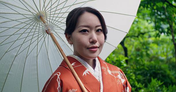 istock Geisha with an umbrella 2223877950