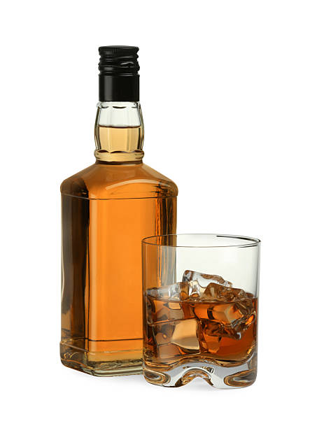 istock Whiskey in glass and bottle isolated on white 2223878066