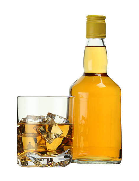 istock Whiskey in glass and bottle isolated on white 2223878076