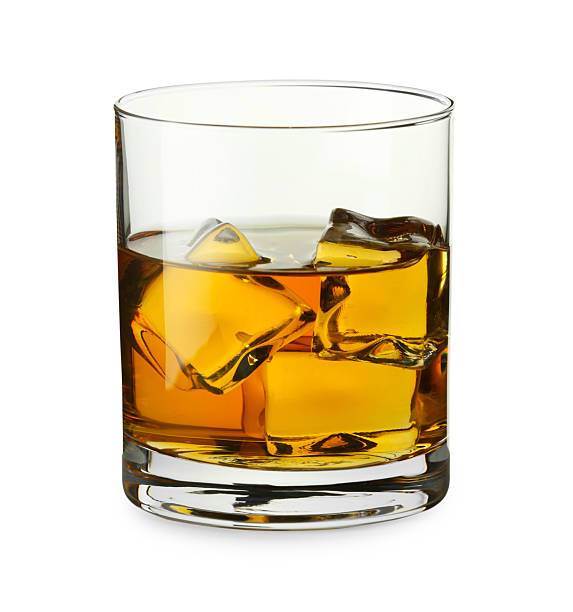 istock Whiskey and ice cubes in glass isolated on white 2223878093