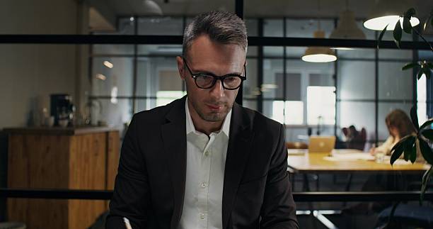 istock A man works in an office 2223879468
