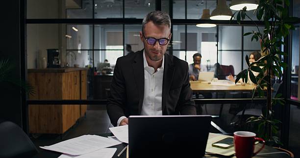 istock A man works in an office 2223879542