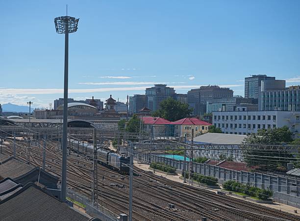 These days, sky of Beijing is rather blue, mostly because source of pollutions are get less and less. All trains are powered by electricity as well as about 35 % of cars. City center of Beijing still stand several ancient buildings like old city wall corner tower etc.