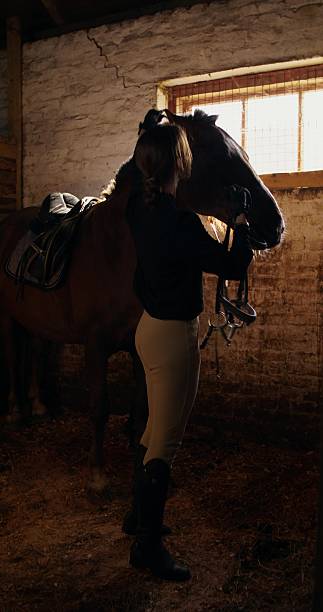 istock A woman with a horse 2223881906