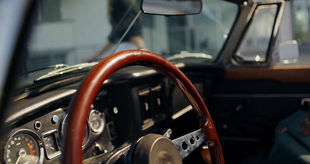 istock A woman in a convertible 2223882823