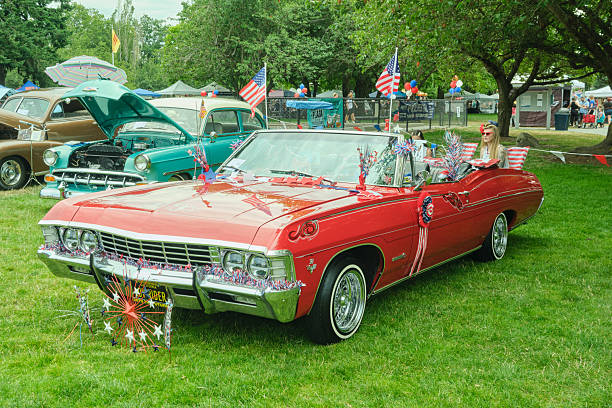 Auburn WA USA, July 4th, 2025 - Retro car show weekend in the park classic Fourth of July tradition, vintage transportation enthusiasts can admire antique cars