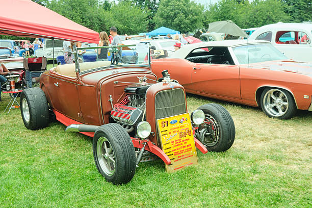 Auburn WA USA, July 4th, 2025 - For a classic Fourth of July tradition, vintage transportation enthusiasts can admire antique cars, trucks, and motorcycles