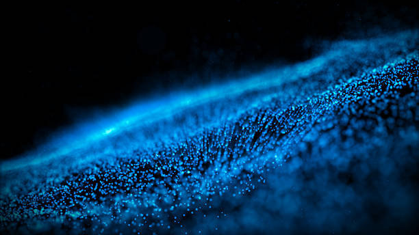 istock An captivating abstract background showcasing a luminous wave of blue particles against a stark black backdrop, ideal for themes of technology, space, or fluid dynamics. 2223893651