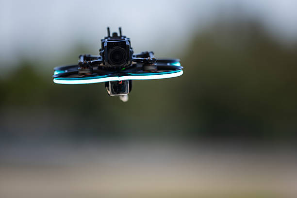 FPV drone ready to fly in mid air.