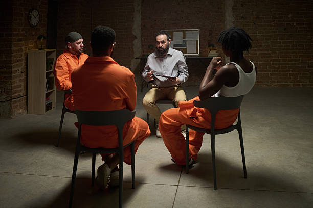 istock Diverse Group of Young Adult Men Participating in Prison Therapy Session 2223899749