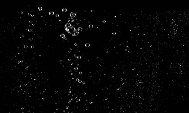 istock Underwater bubbles, Underwater oxygen design concept, Small water drops underwater, On black background, Close-up photography. 2223900819