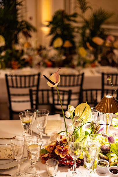istock Romantic Table Setting with Floral Centerpiece and Golden Lamp 2223901443