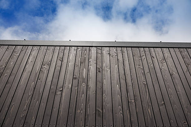 istock Modern Wooden Facade with Blue Sky Background 2223901482