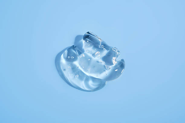 istock The texture of a cosmetic gel on a blue background. 2223904103
