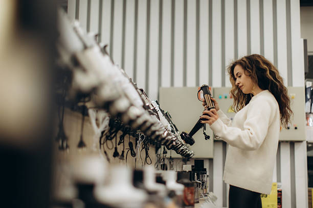 istock Woman Shopping for Electronics in a Modern Retail Store 2223908083